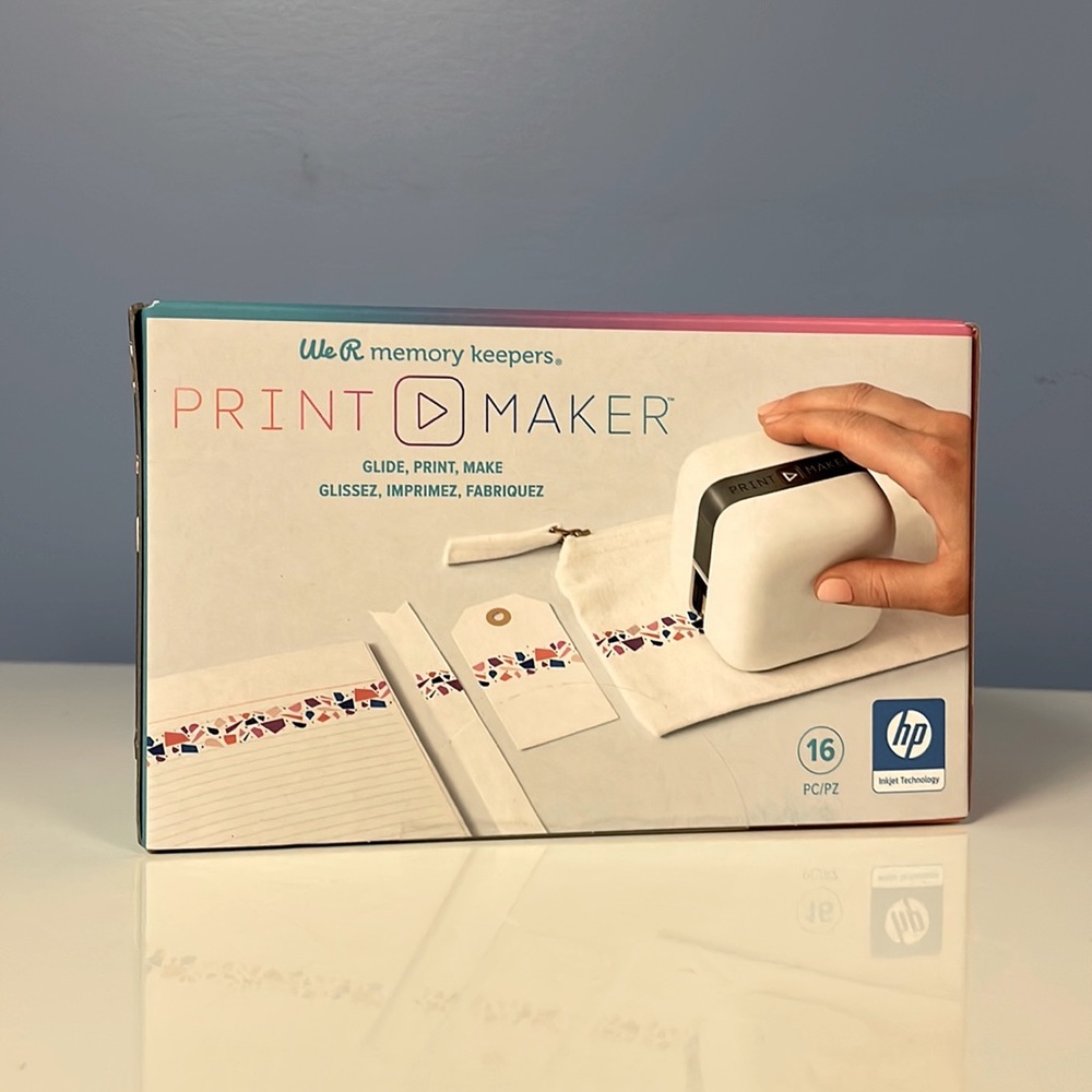 Mini printer. 
Glide, print, and make DIY designs with this handheld PrintMaker.